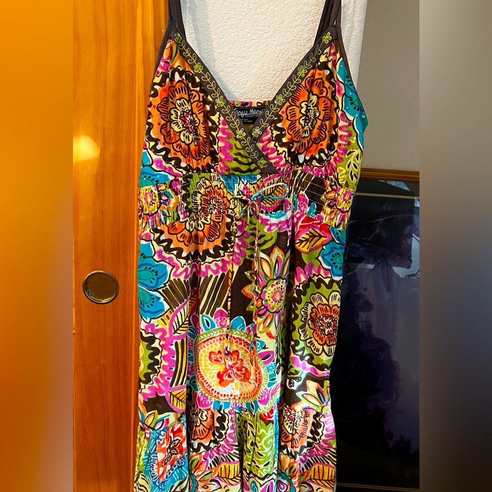 Great 100% cotton strappy dress by Mango Tango. Vibrant print, cool for tropics.